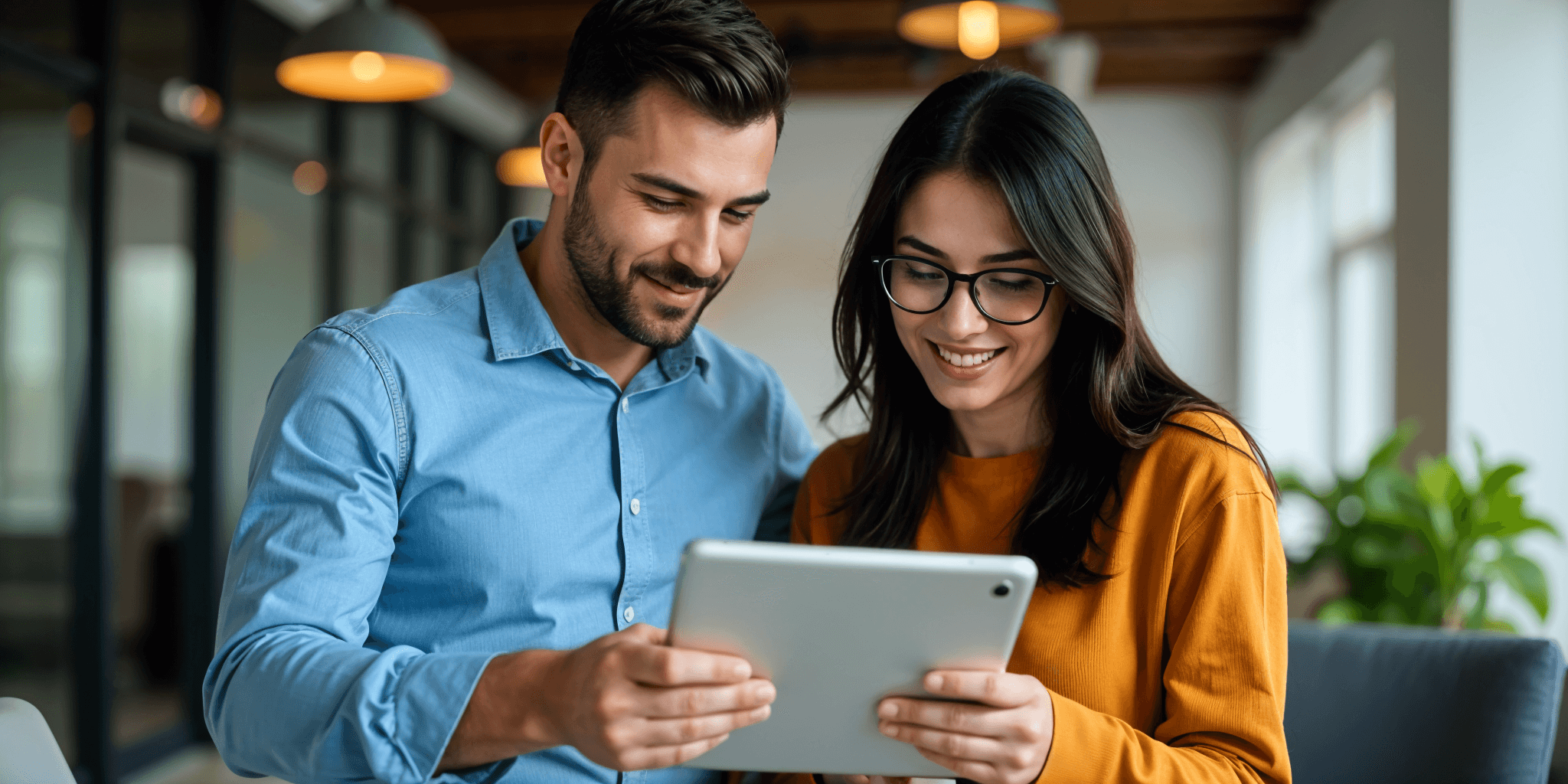 two-people-looking-ipad